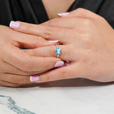 1.25 Carat Oval Cut Blue Topaz SWAROVSKI - December Birthstone Solitaire Engagement Ring in 18k White Gold Over Silver