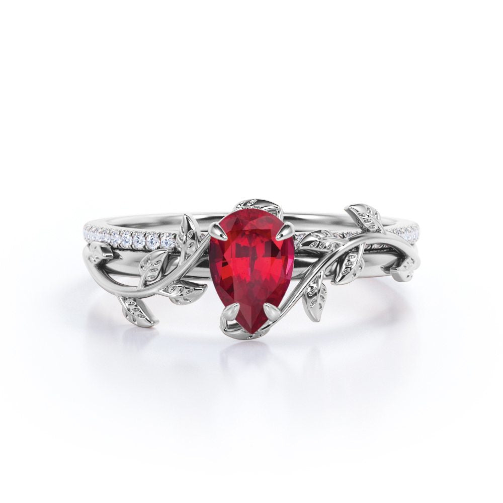 Art Deco Inspired 1.25 carat Pear Cut Lab-Created Ruby and Diamond Pave Bridal ring set in White Gold