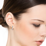 Half-Carat Criss Crossed Moissanite Huggie Earrings in 18K White Gold over Silver