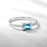 Emerald Cut Blue Topaz - December Birthstone Solitaire Engagement Ring in 18k White Gold Over Silver