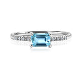 Emerald Cut Blue Topaz - December Birthstone Solitaire Engagement Ring in 18k White Gold Over Silver