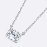 1 Carat Emerald Cut East-West Bezel Moissanite Pendant Necklace in 18K White Gold over Silver