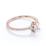 Surface Prong Set 1.50 Carat Pear White Blue Moonstone and Diamond Engagement Ring in Rose Gold