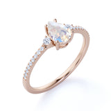 Surface Prong Set 1.50 Carat Pear White Blue Moonstone and Diamond Engagement Ring in Rose Gold