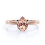 Traditional 1.25 Carat Pear Shaped Orange Peach Morganite and Solitaire Engagement Ring in Rose Gold