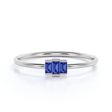 Gradient 0.45 Carat Baguette Shape Corn Blue Sapphire and Petite Trilogy Engagement Ring in White Gold