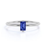 Dainty 0.50 Carat Emerald Shaped Purplish Blue Sapphire and Classic Solitaire Engagement Ring in White Gold