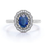 Twist Curl 2.50 Carat Ovoid Shape Purplish Blue Sapphire and Diamond Halo Huge Engagement Ring in White Gold