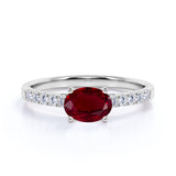 Surface Prong 1.50 Carat Egg Shaped Dark Lab Ruby and Diamond Parallel Engagement Ring in White Gold
