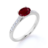Surface Prong 1.50 Carat Egg Shaped Dark Lab Ruby and Diamond Parallel Engagement Ring in White Gold