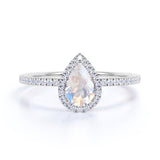 1.50 Carat Pear Shaped Rainbow Moonstone and Moissanite Halo Wedding Ring in 18k White Gold over Silver