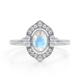 Huge 1.50 Carat Oval Shaped Blue Moonstone and Diamond Antique Engagement Ring in White Gold