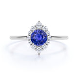 Elegant 0.75 Carat Round Dark Blue Sapphire and Diamond Halo Dainty Engagement Ring in White Gold