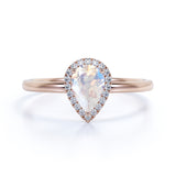 Elegant 1.25 Carat Pear Blue Moonstone and Diamond Pave Engagement Ring in Rose Gold