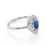 Huge 2 Carat Oval Shaped Dark Blue Sapphire and Diamond Antique Engagement Ring in White Gold