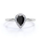 Elegant 1.25 Carat Pear Created Lab Black Diamond and Pave Engagement Ring in White Gold