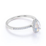 1.50 Carat Pear Shaped Rainbow Moonstone and Moissanite Halo Wedding Ring in 18k White Gold over Silver
