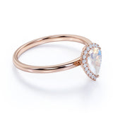 Elegant 1.25 Carat Pear Blue Moonstone and Diamond Pave Engagement Ring in Rose Gold