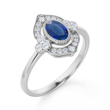 Huge 2 Carat Oval Shaped Dark Blue Sapphire and Diamond Antique Engagement Ring in White Gold