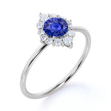 Elegant 0.75 Carat Round Dark Blue Sapphire and Diamond Halo Dainty Engagement Ring in White Gold
