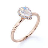 Elegant 1.25 Carat Pear Blue Moonstone and Diamond Pave Engagement Ring in Rose Gold