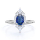 Petite 0.80 Carat Oval Shape Royal Blue Sapphire and Diamond Cluster Engagement Ring in White Gold