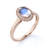 Massive 1.25 Carat Oval Dark Blue Moonstone and Diamond Halo Engagement Ring in Rose Gold