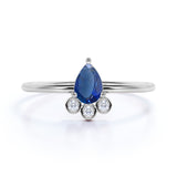 Dainty Bezel Set Pear Shape Peacock Blue Sapphire and Diamond Unique Engagement Ring in White Gold