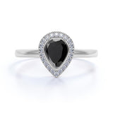 Bezel Setting Shared Prong 1.25 Carat Teardrop Lab Lab Black Diamond and Pave Engagement Ring in White Gold