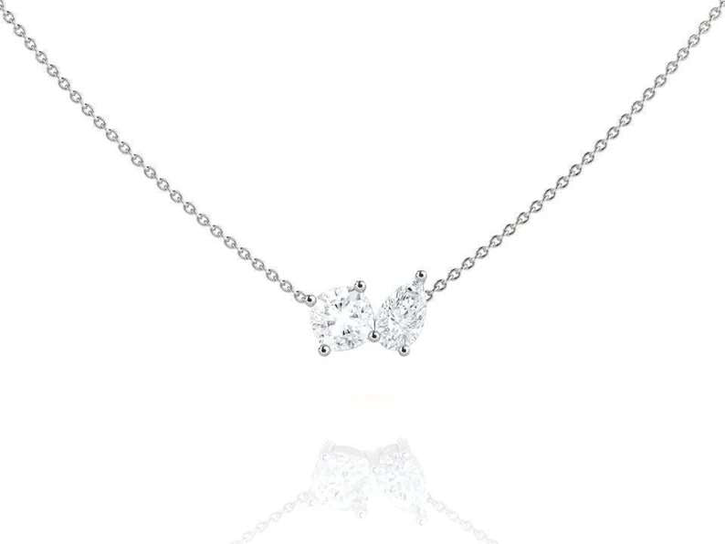 Matching Two Stone Round and Pear cut Diamond Pendant Necklace for Womein in 18k White Gold over Silver