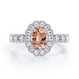 Vintage Floral Halo 0.7 carat Oval and Round Morganite and diamond Engagement Ring in Rose Gold