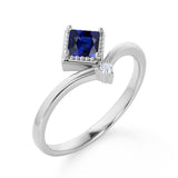 Geometric 1.05 Carat Princess Cut Natural Blue Sapphire and 2 Stone Diamond Contour Engagement Ring in White Gold