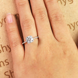 Cushion Halo Design 1.25 Carat Round Cut Moissanite Pave Prong Set Engagement Ring In 18K White Gold Plating Over Silver