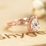 1.75 Carat pear cut Moissanite and Diamond Wedding Ring Set in 10k Rose Gold