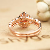 1.75 Carat pear cut Moissanite and Diamond Wedding Ring Set in 10k Rose Gold