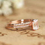 1.50 Carat emerald cut Moissanite and Diamond Halo Bridal Set in 10k Rose Gold
