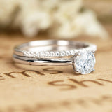 Four Prong 1.25 Carat Round Cut Moissanite Bridal Set