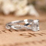 1.25 Carat emerald cut Moissanite and Diamond Solitaire Infinity Engagement Ring in 10k White Gold