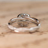 1.5 Carat Cushion Cut Moissanite And Diamond Halo Bridal Set In White Gold