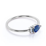 Beautiful East West Pear Navy Blue Sapphire and Diamond Minimalist Engagement Ring in White Gold