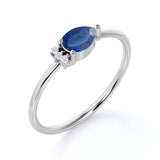 Beautiful East West Pear Navy Blue Sapphire and Diamond Minimalist Engagement Ring in White Gold