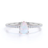 Solitair 0.75 Ct Pear Cut Lab Created Opal Promise Ring