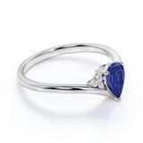Geometric 1.75 Carat Pear Purplish Blue Sapphire and Diamond Contoured Engagement Ring in White Gold