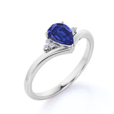 Geometric 1.75 Carat Pear Purplish Blue Sapphire and Diamond Contoured Engagement Ring in White Gold