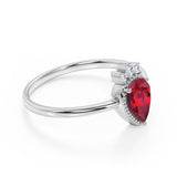 Bezel Design 1.15 Carat Pear Shaped Ruby and Diamond Crown Engagement Ring in White Gold