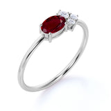 Tiny Asymmetric Oval Ruby and 4 Stone Diamond Vintage Engagement Ring in White Gold