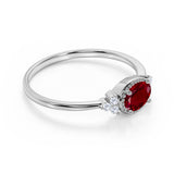 Unique East West 1.40 Carat Oval Cut Lab Ruby and 7 Stone Diamond Engagement Ring in White Gold