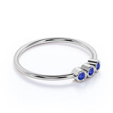 Classic Trilogy Round Shaped Dark Blue Lab-Created Sapphire and Minimalist Bezel Stackable Ring Band in White Gold