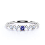Minimalist 0.35 Carat Round Shaped Violet Tanzanite and Antique Diamond Engagement Ring in White Gold