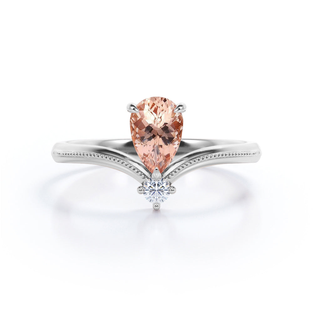 Two Stones 0.55 carat Pear Morganite and Moissanite Nestled Engagement Ring in White Gold